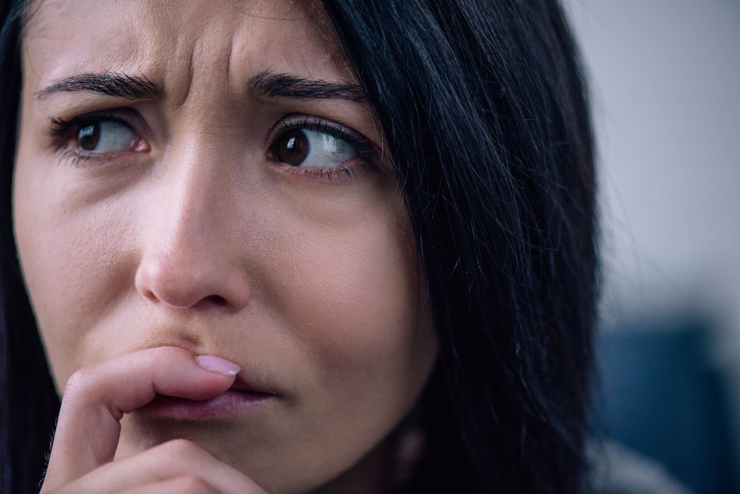 upset woaman suffering from a personal crisis. Nisus psychology is here to help